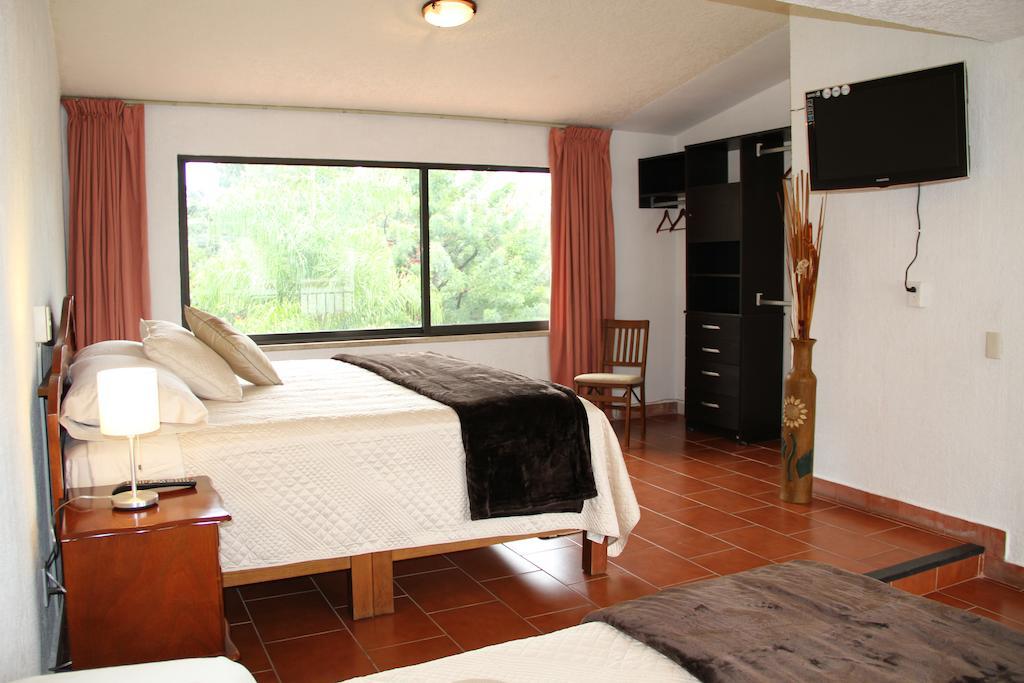 Hotel Quinta del Sol Tepoztlán Quarto foto